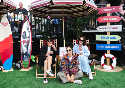 BeachLife Festival goers capturing polaroids at the HighTide VIP Deck sponsored by Beach Now