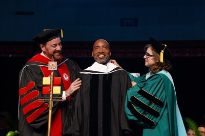 NFL Hall of Famer Rondé Barber is awarded the degree Doctor of Humane Letters, honoris causa at Florida Southern College