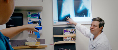 Dr. Jason Stoneback reviews x-rays.