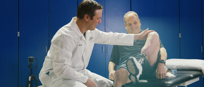 Dr. Jason Stoneback with patient.
