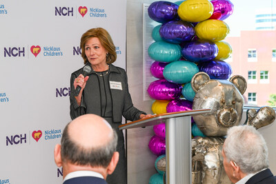 Julia Van Domelen addresses the crowd during the announcement reception.